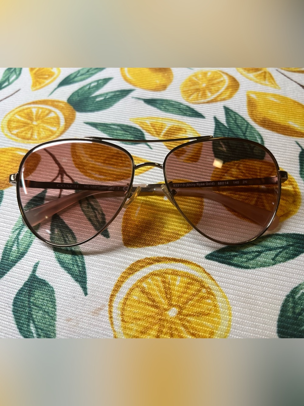 Coach Rose Gold Aviator Sunglasses with Pink Gradient Lenses